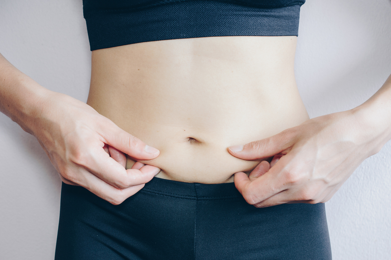 Shot of woman worry about her cellulite.